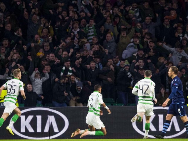 Fans go wild as Christopehr Jullien (centre) wheels away after netting a late goal
