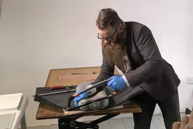 Mr Boyes used a saw to open the capsule.