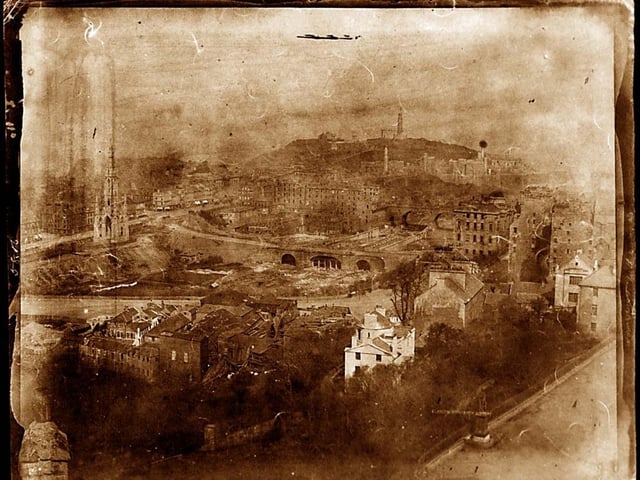 The Scott Monument towers above the nearby architecture in this view of central Edinburgh from the ramparts of the castle.